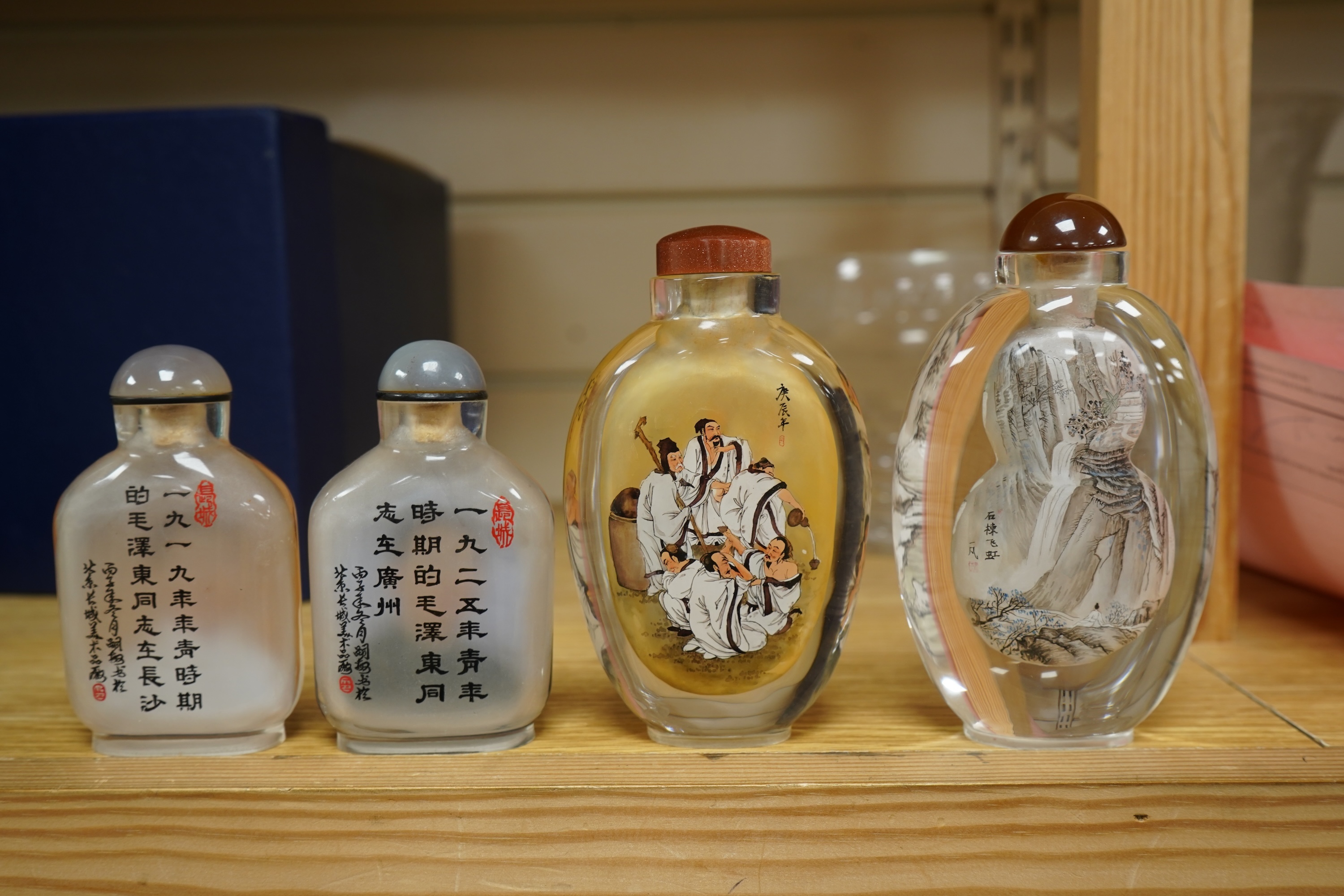 Four Chinese inside painted glass snuff bottles, 1960's-80's, tallest 13.5cm